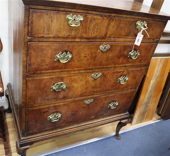 A George II walnut chest on later stand W.96cm